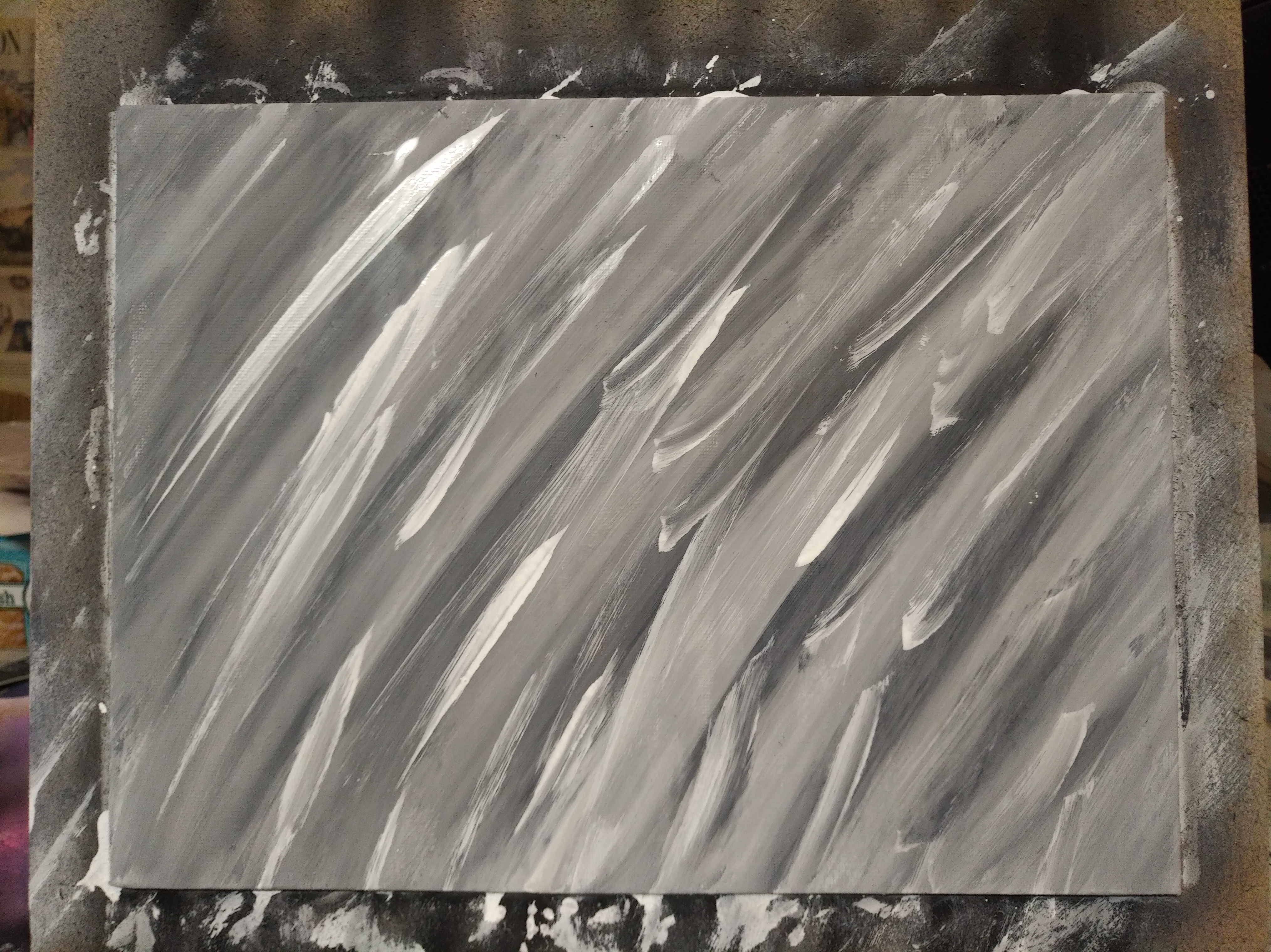 a black and white painting. it might be a snowstorm or it might be a piece of plastic. you decide